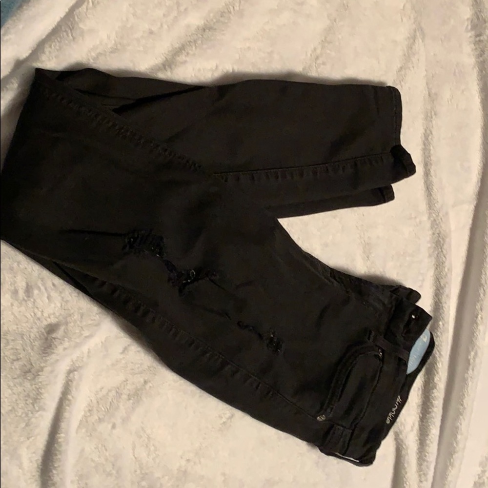 Black ripped, skinny jeans.